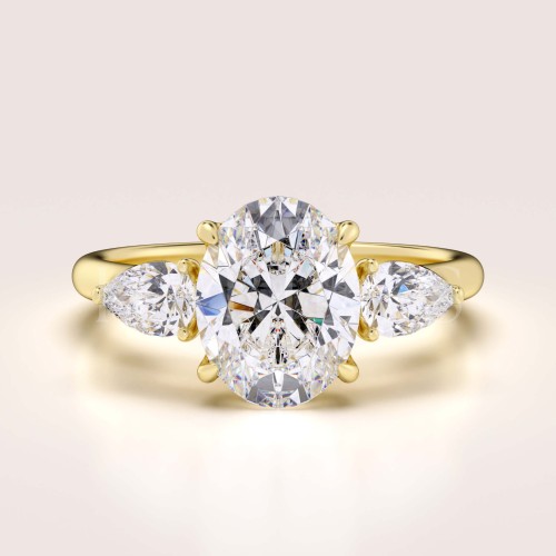 bague-de-fiancailles-trinity-seraphina-moissanite-2ct-pierre-centrale-taille-ovale-or-jaune-hariets.jpg