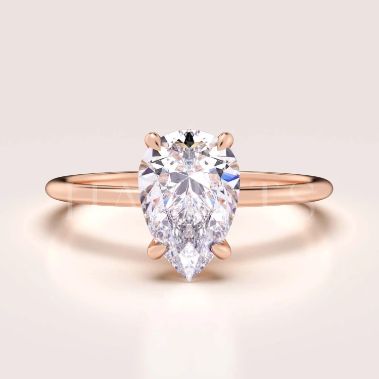 bague-de-fiançailles-solitaire-lumiere-moissanite-1-5ct-poire-or-rose-hariets.jpg