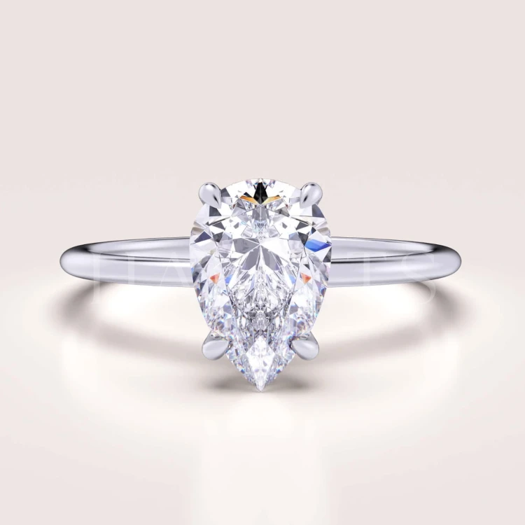 bague-de-fiançailles-solitaire-lumiere-moissanite-1-5ct-poire-or-blanc-hariets.jpg