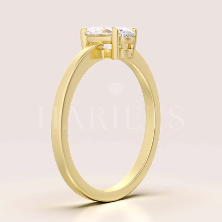 bague-de-fiancailles-solitaire-astra-moissanite-1ct-taille-ovale-profil-or-jaune-hariets.jpg
