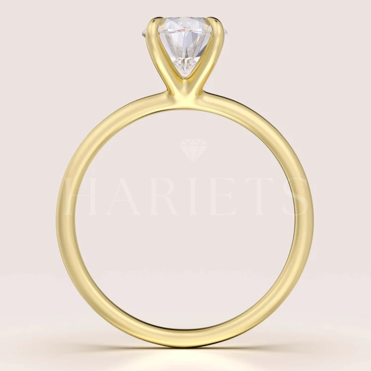 bague-de-fiancailles-solitaire-forever-moissanite-1_5ct-taille-ovale-face-or-jaune-hariets.jpg