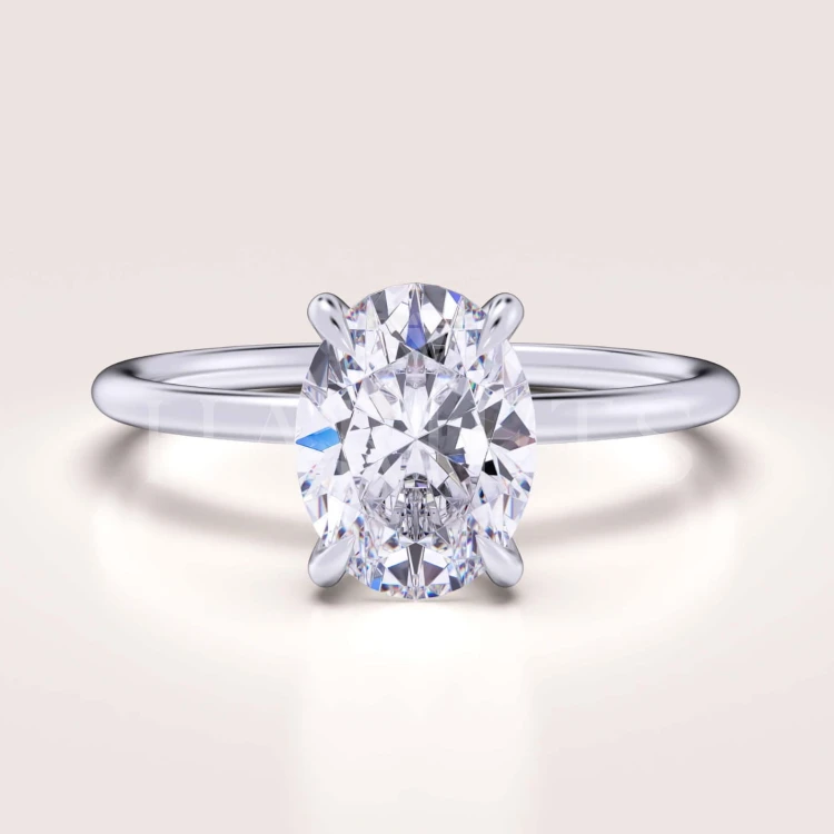 bague-de-fiancailles-solitaire-forever-moissanite-1_5ct-taille-ovale-or-blanc-hariets.jpg