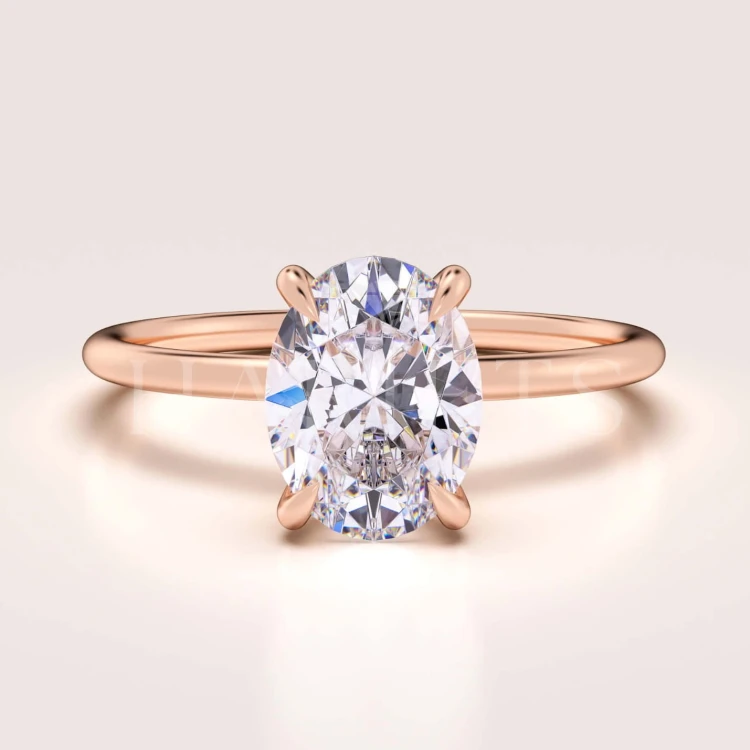 bague-de-fiancailles-solitaire-forever-moissanite-1_5ct-taille-ovale-or-rose-hariets.jpg