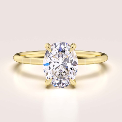 bague-fiancailles-solitaire-forever-moissanite-1_5ct-taille-ovale-or-jaune-hariets.jpg