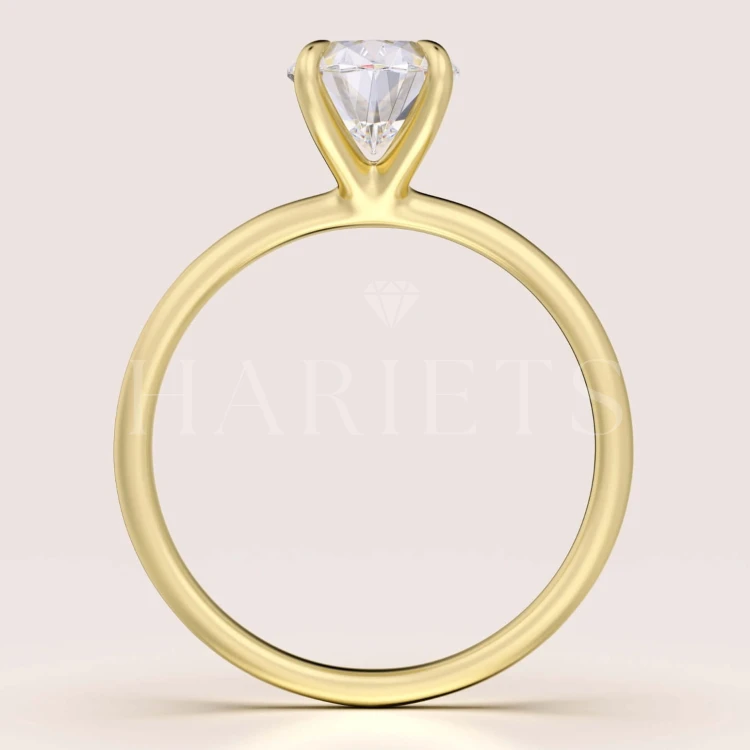 bague-fiancailles-solitaire-forever-moissanite-1_5ct-face-taille-ovale-or-jaune-hariets.jpg