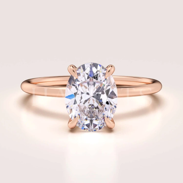 bague-fiancailles-solitaire-forever-moissanite-1_5ct-taille-ovale-or-rose-hariets.jpg