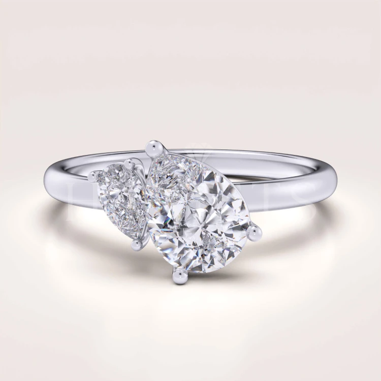 bague-de-fiancailles-toi-et-moi-moissanite-1-6ct-taille-poire-or-blanc-twin-pears-hariets.jpg
