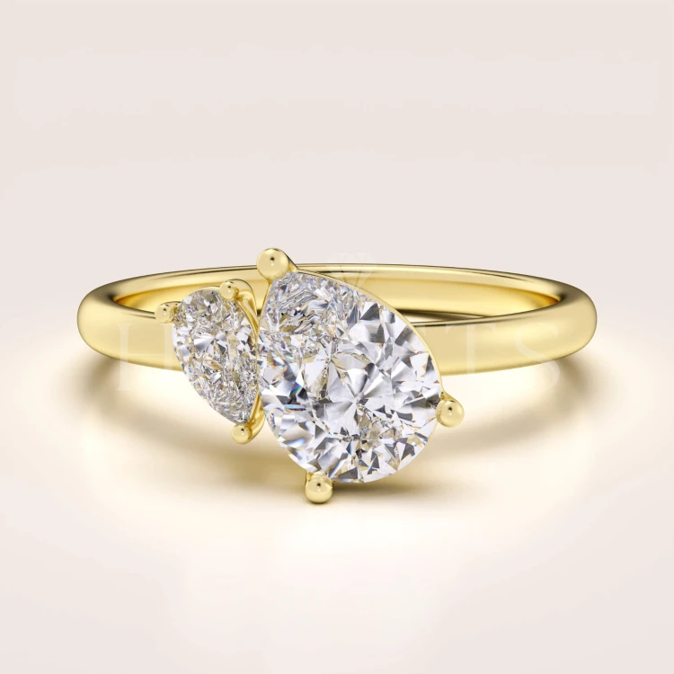 bague-de-fiancailles-toi-et-moi-moissanite-1-6ct-taille-poire-or-jaune-twin-pears-hariets.jpg