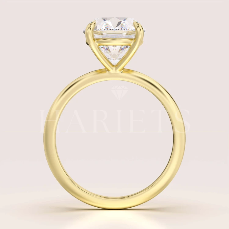 bague-de-fiancailles-royal-stones-moissanite-5ct-taille-ovale-face-or-jaune-paris-hariets.jpg