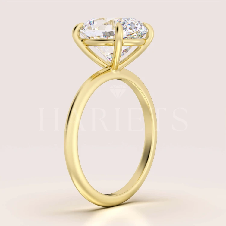 bague-de-fiancailles-royal-stones-moissanite-5ct-taille-ovale-profil-or-jaune-paris-hariets.jpg