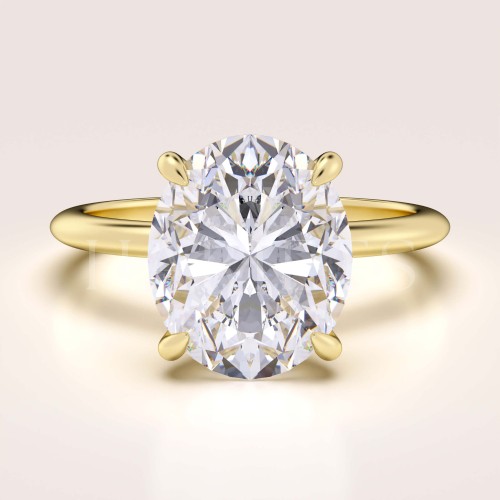 bague-de-fiancailles-royal-stones-moissanite-5ct-taille-ovale-or-jaune-paris-hariets.jpg