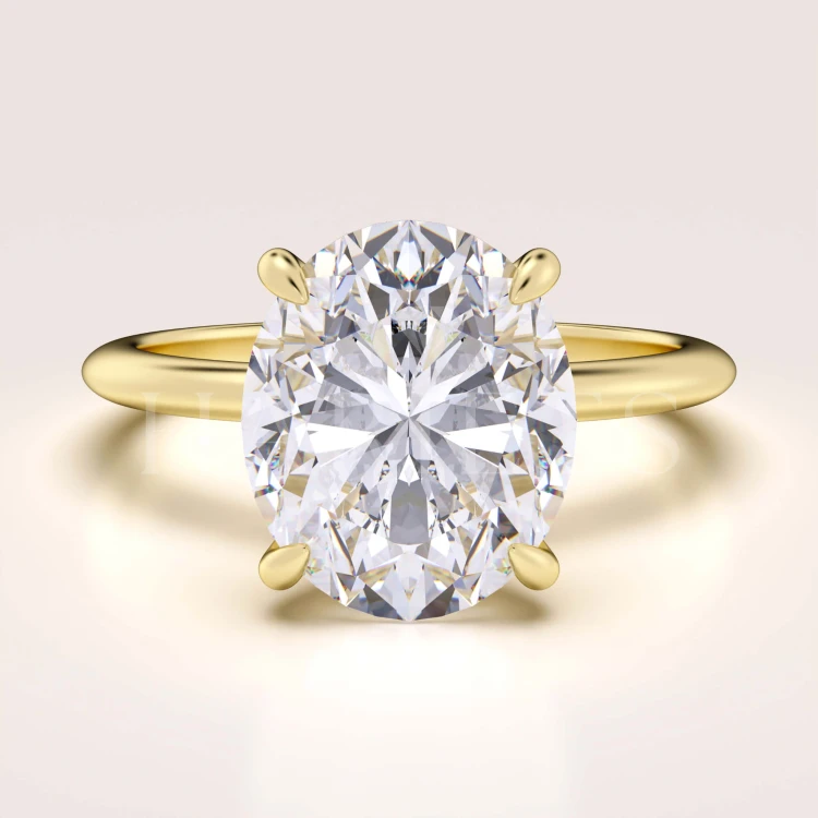bague-de-fiancailles-royal-stones-moissanite-5ct-taille-ovale-or-jaune-paris-hariets.jpg
