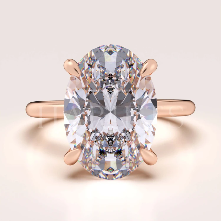 bague-de-fiancailles-royal-stones-moissanite-5ct-taille-ovale-or-rose-bella-hariets.jpg