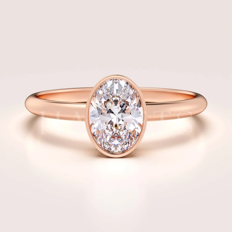 bague-de-fiancailles-bezel-moissanite-0-5ct-taille-ovale-or-rose-pure-hariets.jpg