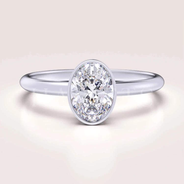 bague-de-fiancailles-bezel-moissanite-0-5ct-taille-ovale-or-blanc-pure-hariets.jpg