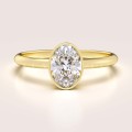 bague-de-fiancailles-bezel-moissanite-0-5ct-taille-ovale-or-jaune-pure-hariets.jpg