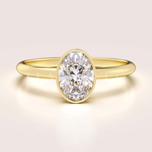 bague-de-fiancailles-bezel-moissanite-0-5ct-taille-ovale-or-jaune-pure-hariets.jpg