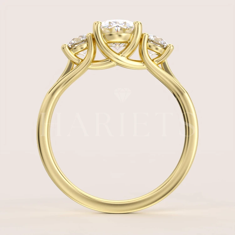 bague-de-fiancailles-trinity-avec-moissanites-taille-ovale-1ct-face-or-jaune-luminance-hariets.jpg