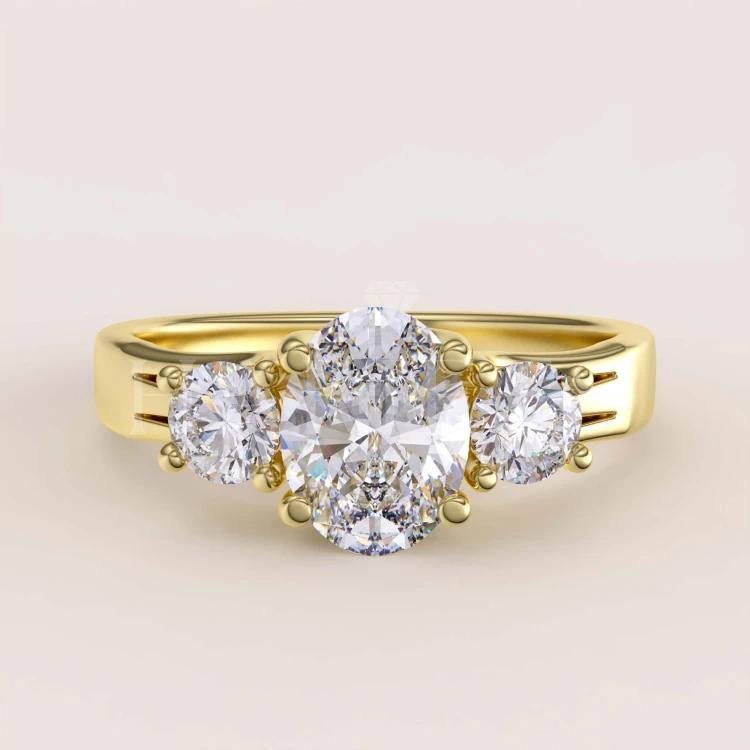bague-de-fiancailles-trinity-avec-moissanites-taille-ovale-1ct-or-jaune-luminance-hariets.jpg