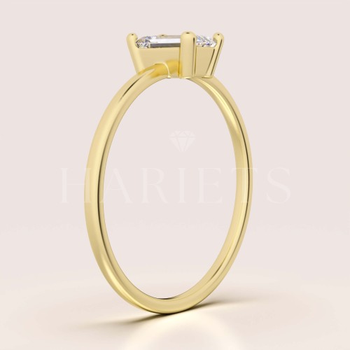 bague-fiancailles-petit-diamant-laboratoire-0-5ct-taille-emeraude-cote-or-jaune-finesse-hariets.jpg