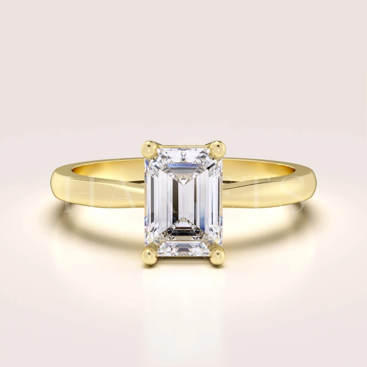 bague-fiancailles-solitaire-rapture-moissanite-1ct-taille-emeraude-or-jaune-hariets.jpg