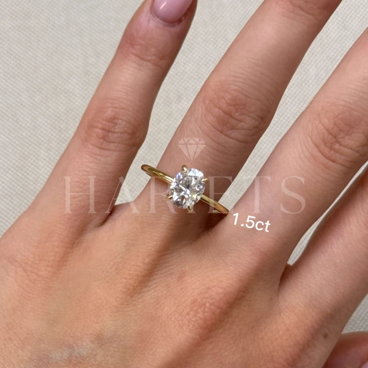 bague-fiancailles-solitaire-forever-diamant-1_5ct-taille-ovale-main-or-jaune-hariets.jpg