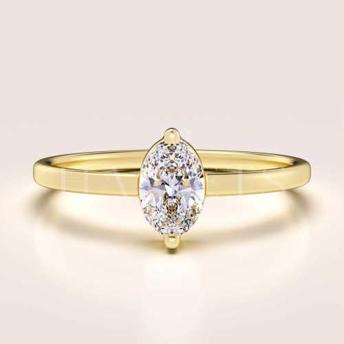 bague-fiancailles-petit-moissanite-0-5ct-taille-ovale-or-jaune-mystique-hariets.jpg