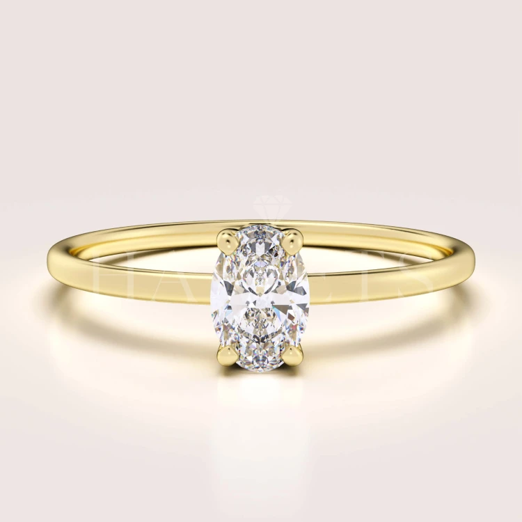 bague-fiancailles-petit-moissanite-0-5ct-taille-ovale-or-jaune-gracelet-hariets.jpg