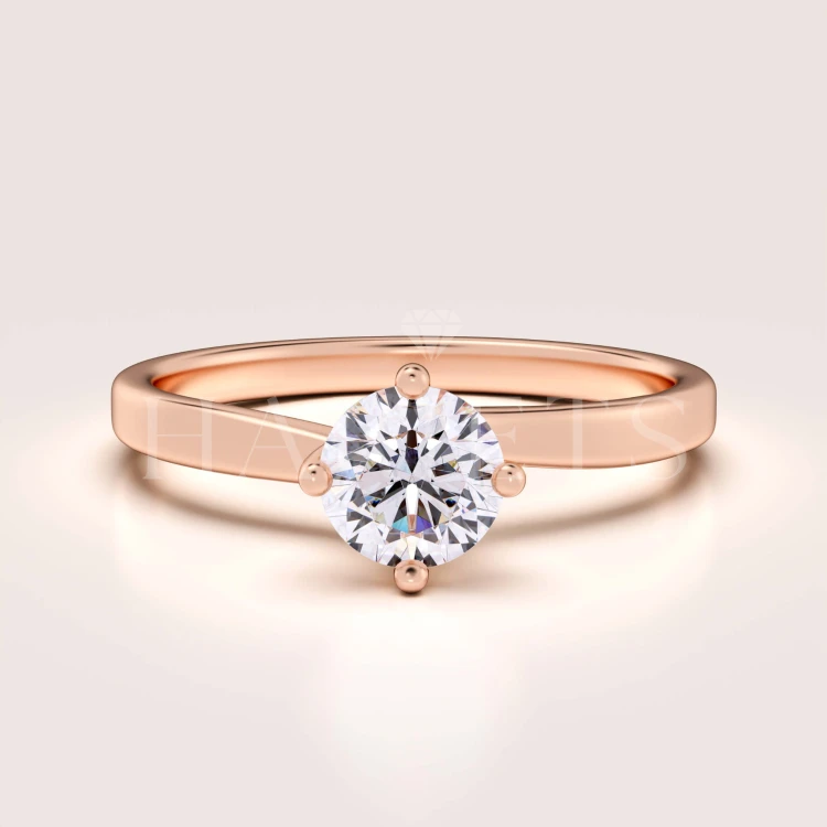 bague-fiancailles-solitaire-bloom-moissanite-0-6ct-taille-brillant-or-rose-hariets.jpg