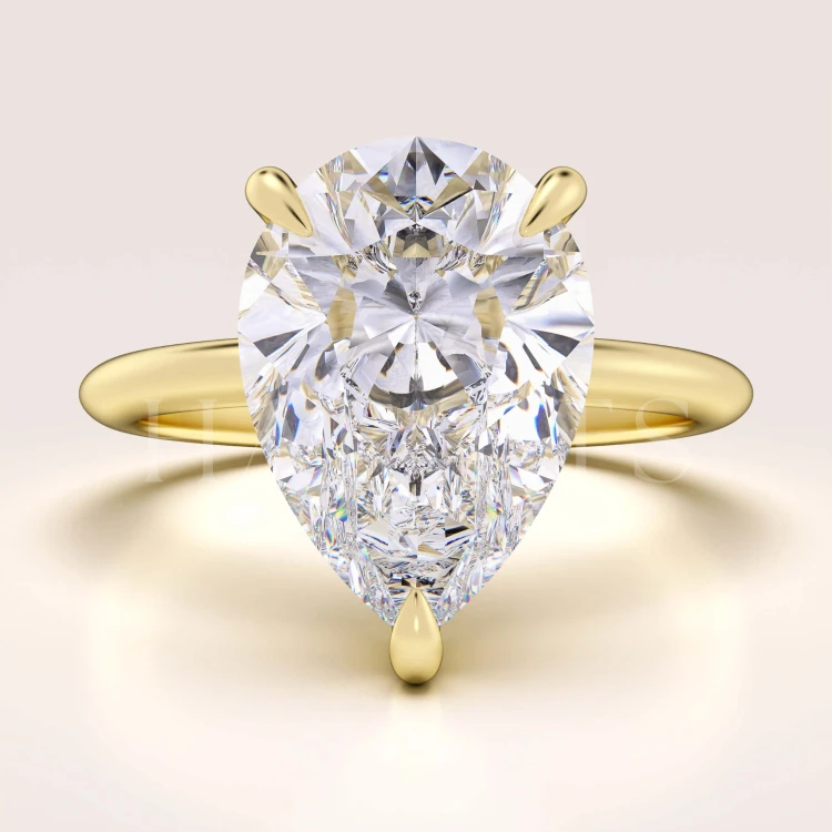 bague-fiancailles-royal-stones-moissanite-4ct-taille-poire-argent-dore-glitare-hariets.jpg
