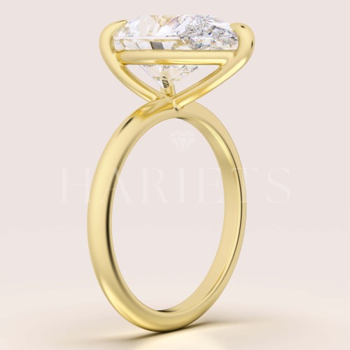 bague-fiancailles-royal-stones-moissanite-4ct-taille-poire-côté-or-jaune-glitare-hariets.jpg