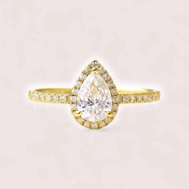 bague-halo-avec-moissanite-1ct-taille-poire-or-jaune-hariets.jpg