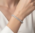 bracelet-tennis-avec-moissanites-5mm-argent-925-sur-le-modele-hariets.jpg