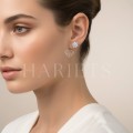 clous-d-oreilles-en-forme-de-fleur-avec-moissanites-argent-925-oreille.jpg