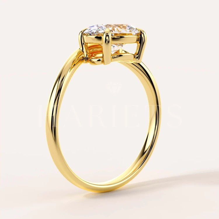 bague-fiancailles-moissanite-1_5ct-taille-ovale-or-jaune-cote-icon-hariets.jpg