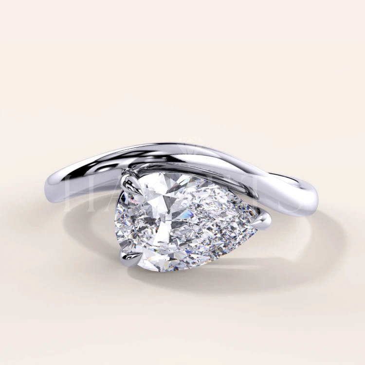 bague-fiancailles-moissanite-1_5ct-taille-poire-argent-icon-hariets.jpg