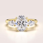 Bague de fiançailles Trinity avec diamant de laboratoire 2 ct taille ovale entouré de diamants poire – Seraphina or 585