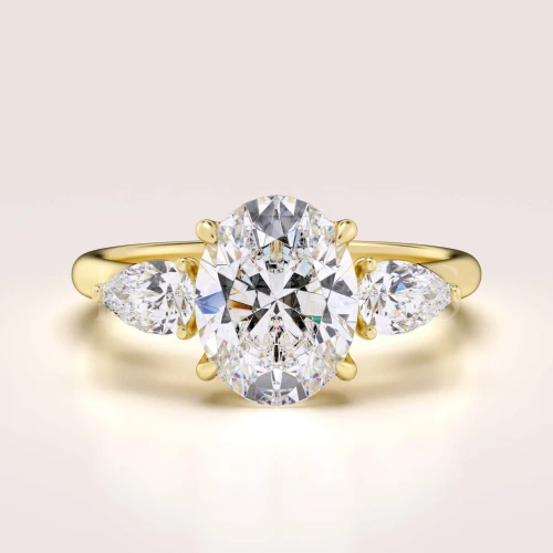 bague-de-fiancailles-trinity-seraphina-diamant-de-laboratoire-2ct-pierre-centrale-taille-ovale-or-jaune-hariets.jpg