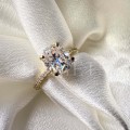 bague-fiancailles-halo-aria-diamant-de-laboratoire-2ct-taille-ovale-gros-plan-face-or-jaune-hariets.jpg