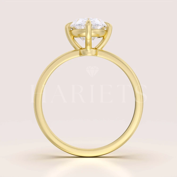 bague-de-fiançailles-royal-stones-stella-moissanite-3_5ct-taille-ovale-face-or-jaune-hariets.jpg