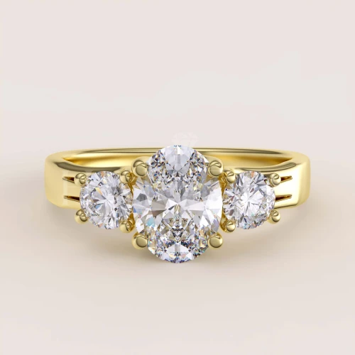 bague-de-fiancailles-trinity-avec-moissanites-taille-ovale-1ct-or-jaune-luminance-hariets.jpg