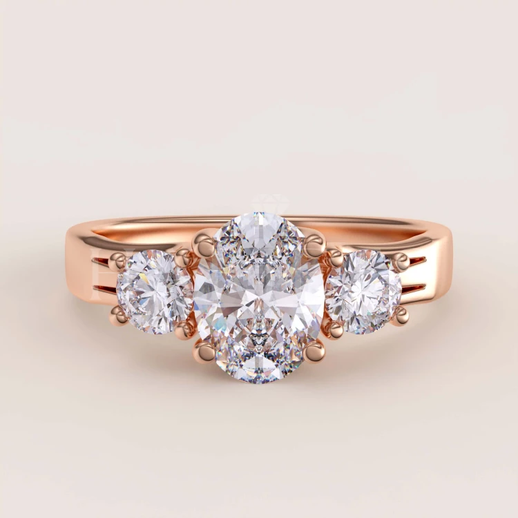 bague-de-fiancailles-trinity-avec-moissanites-taille-ovale-1ct-or-rose-luminance-hariets.jpg