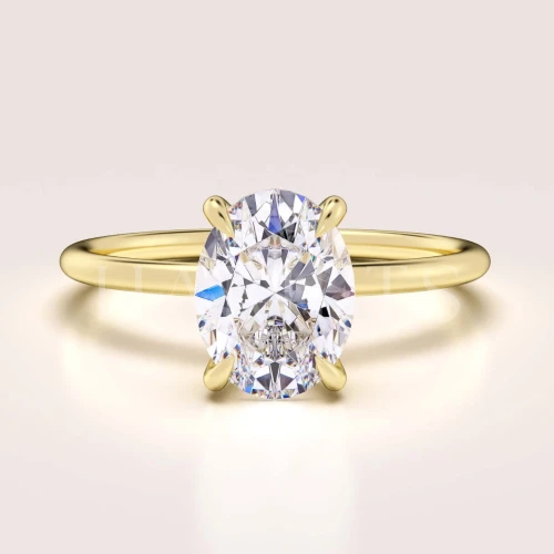 bague-fiancailles-solitaire-forever-moissanite-1_5ct-taille-ovale-or-jaune-hariets.jpg