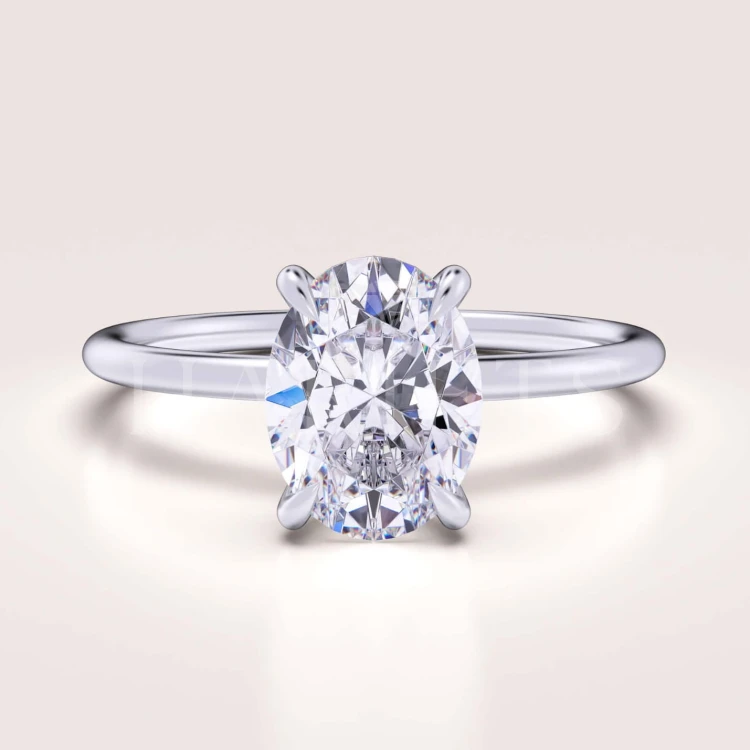 bague-fiancailles-solitaire-forever-moissanite-1_5ct-taille-ovale-or-blanc-hariets.jpg